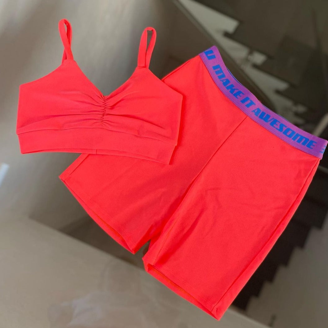 Twerk outfit with tight shorts and sports bra