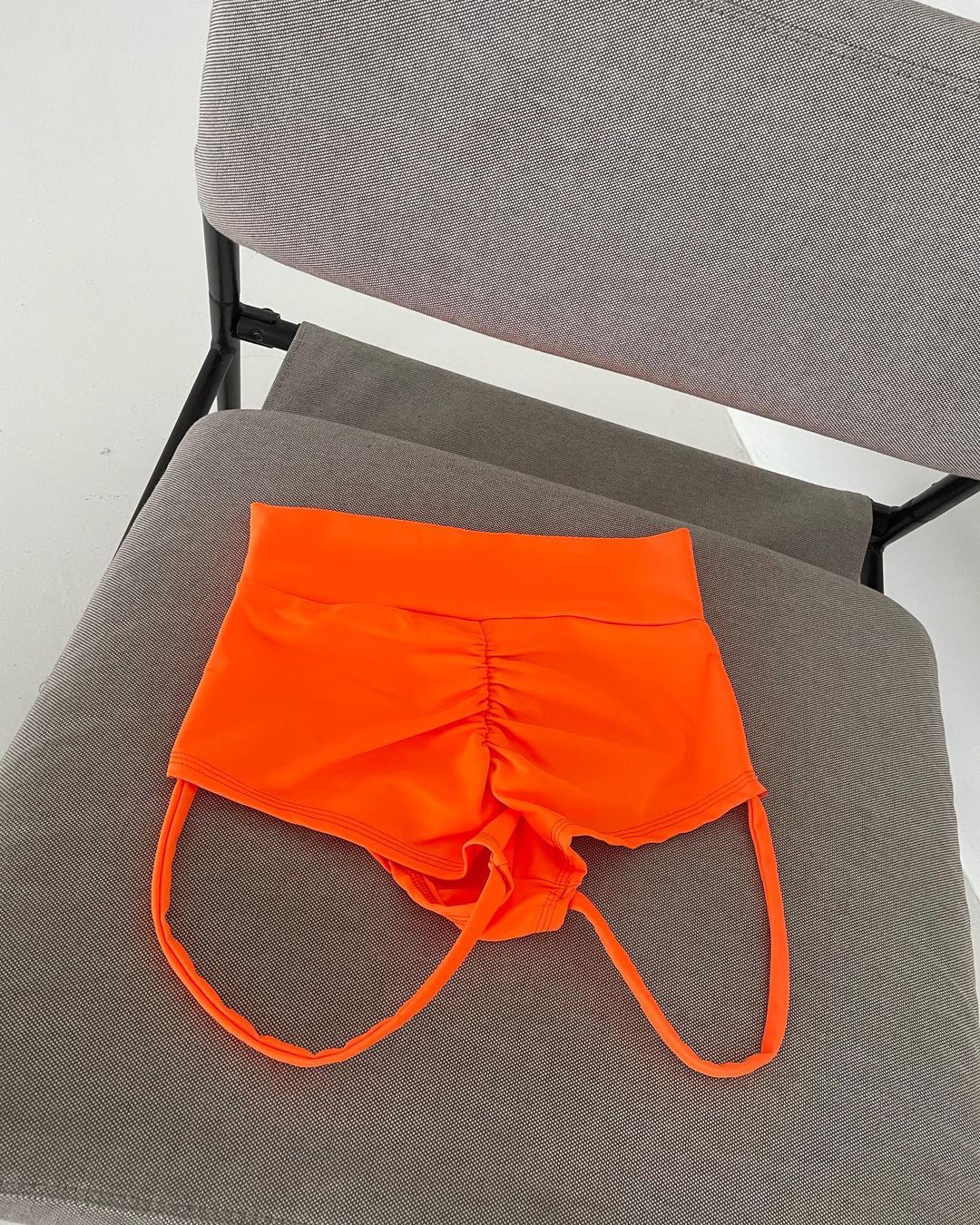 orange Twerk high waisted booty shorts with back garters